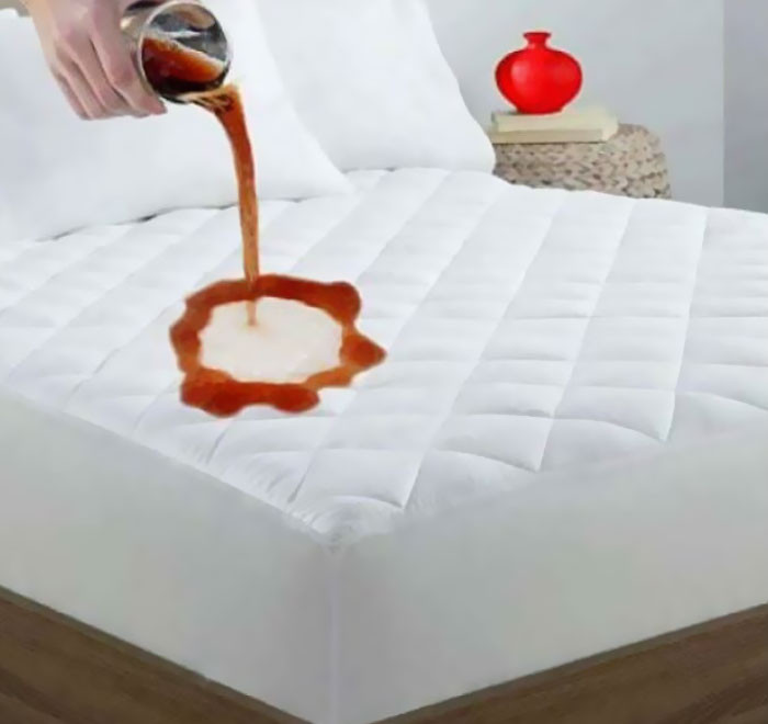 38. This mattress pad will protect your bed from giant disembodied hands that pour old soda onto invisible flat surfaces.