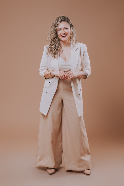 Free Model in Beige Longline Blazer and Wide Leg Pants Stock Photo